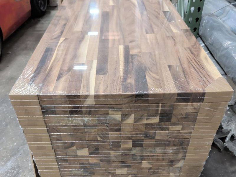 Stack of walnut butcher block countertops