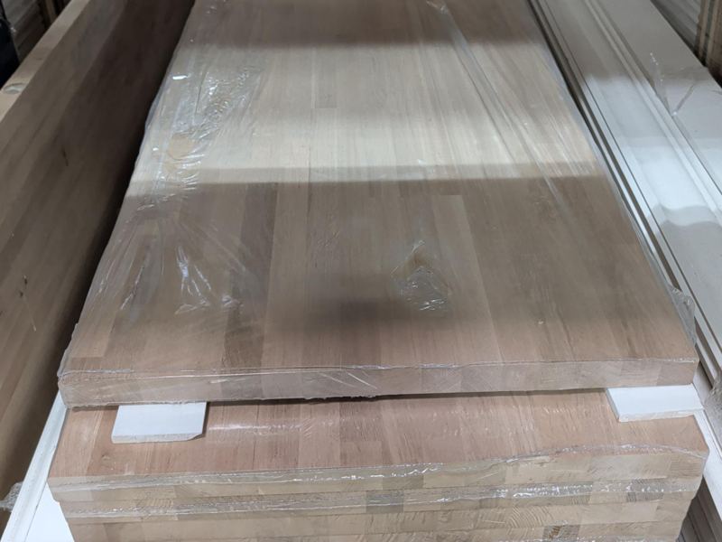 Stack of 12 foot white oak butcher block countertops